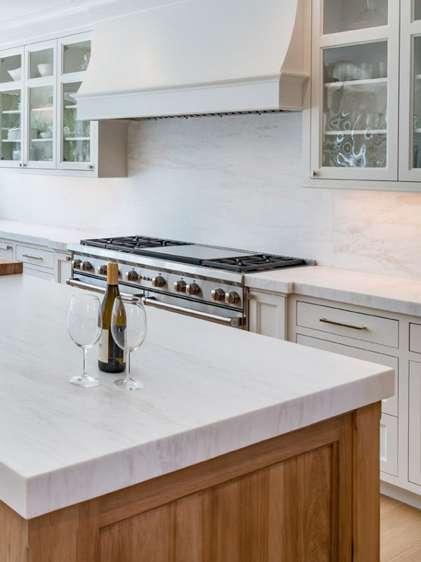 Porcelain countertop in white kitchen